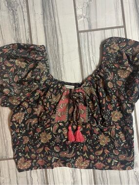 EARTHBOUND Black Floral Crop Top with Red Tassels